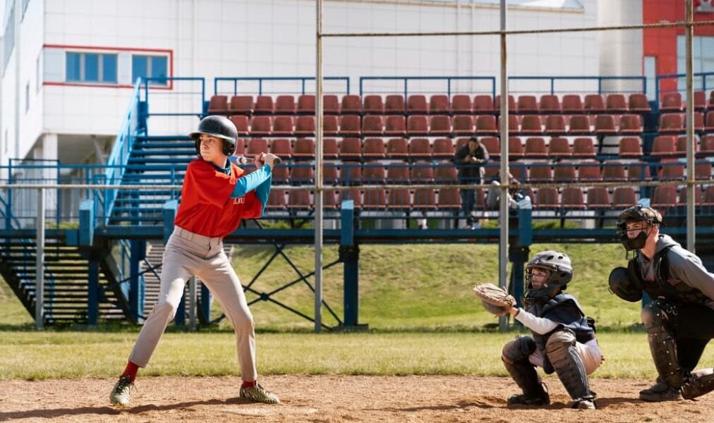 A youth baseball player ready to hit in a game