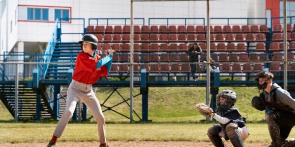 A youth baseball player ready to hit in a game